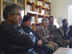 Members of the jail committee discuss the contents of the next issue of the prison newspaper. © IRIN